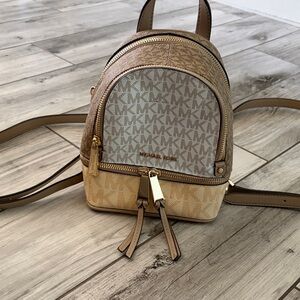 Michael Kors Beige and Tan mini Monogram convertible Backpack